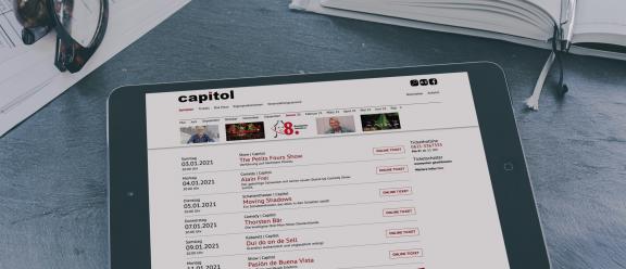 Spielplan der Capitol-Website dargstellt auf einem Tablet